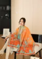 Detailed view of the autumn winter printed cashmere feel shawl scarf in vibrant orange blue. - Orange Bamboo Shadows