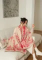 Detailed view of the cozy winter jacquard floral shawl, elegant draped lifestyle scene. - Red Rabbit Garden