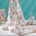 Floral printed lightweight sunscreen fabric detail shot, elegant drape with golden stand display. - SJT-8