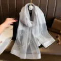 Elegant silver grey organza scarf with faux pearls and rhinestones, perfect for sun protection and travel. - Gray