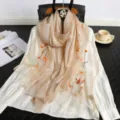 Elegant silk wool embroidered scarf for women, featuring delicate floral patterns and soft fabric. - Off White