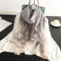 Detailed view of the elegant autumn winter silk wool blended scarf with exquisite floral embroidery. - Gray