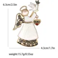 Detail view of vintage enamel angel brooch with peace dove design, showing exact dimensions. - KC Gold White Angel (1917-WH) / White