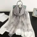 Grey silk scarf with delicate floral embroidery and rhinestone details for women elegance. - Gray