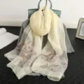 Exquisite mulberry silk scarf featuring delicate floral embroidery and sparkling rhinestones. - Off White
