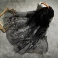 Detailed view of luxury black mulberry silk long scarf featuring delicate metallic embroidery. - Black / Above 185cm