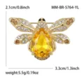 Gold tone alloy crystal bee brooch pin, elegant rhinestone insect jewelry for women. - Yellow