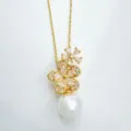 Gold plated flower pearl pendant necklace detailed view, elegant fashion jewelry accessory. - Pendant Only (No Chain) / Gold (Acrylic Pearl)