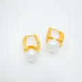 Gold plated pearl earrings detail closeup, elegant drop fashion jewelry accessory. - Stud Earrings - Gold (Artificial Pearl)