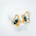 Exquisite butterfly pearl earrings detail, gold-plated delicate design, elegant jewelry. - Stud Earrings - Gold (Artificial Pearl)