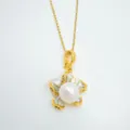 Elegant gold chain necklace featuring a pearl flower pendant with delicate petals. - Flower-Medium-Pendant (Artificial Pearl) / Without Chain