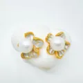 Close-up detail of luxury pearl flower stud earrings with gold trim, elegant jewelry piece. - Flower-Medium-Ear Studs (Artificial Pearl) / Stud Earrings
