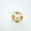 Exquisite geometric pearl ring featuring mother-of-pearl and sparkling zircon in fine gold detail. - White Shell Ring - Gold / Faux Pearl