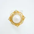 Close-up of gold plated pearl clover ring with micro inlaid cubic zirconia details for women. - Ring (Artificial Pearl) / White-Gold