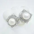 Luxurious silver pearl stud earrings with sparkling micro-pave diamonds and clover design. - Stud Earrings (Artificial Pearl) / White Shell - Silver