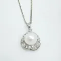 Elegant pearl pendant necklace with sparkling cubic zirconia and delicate silver chain detail. - Pendant / Silver (Acrylic Pearl)
