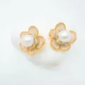 Detailed view of luxury camellia pearl earrings with gold plating and sparkling crystals. - Earrings - White - Artificial Pearl