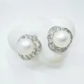 Elegant pearl stud earrings with sparkling cubic zirconia halo, perfect for daily wear. - Stud Earrings / Silver (Artificial Pearl)