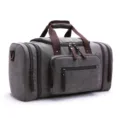 Large capacity canvas travel duffel bag, portable weekend bag with shoulder strap and pockets. - Gray