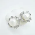 Detailed close-up of geometric square pearl earrings with sparkling crystal rhinestones. - Geometric Style - Silver - Artificial Pearl