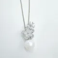 Elegant silver-tone flower pendant necklace with a white pearl drop for women fashion. - Pendant Only (No Chain) / Silver (Acrylic Pearl)
