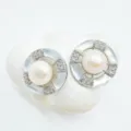 Elegant geometric pearl stud earrings detailed with shimmering mother of pearl and pavé crystals. - White Shell Earrings - Silver / Faux Pearl