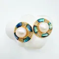 Close-up detail of pearl abalone shell geometric gold plated earrings with micro pave crystals. - Abalone Shell Earrings - Gold / Faux Pearl