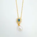 Vue détaillée du collier pendentif perle saphir, accessoire de bijoux doré élégant. - Pendentif Uniquement (Sans Chaîne) / Perle Naturelle / Or