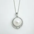 Elegant sterling silver pearl pendant necklace with sparkling cubic zirconia halo details. - Pendant Only (Without Chain) / With Artificial Pearl / Silver