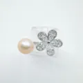 Pearl and sparkling cubic zirconia flower jewelry accessory with elegant silver tone metal finish. - Ring / Silver (Natural Pearl)