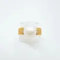 Elegant gold pearl ring variant with textured band and sparkling accent stones for women. - Ring / Acrylic Beads / Gold