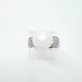 Elegant white pearl ring with sparkling pavé zircon stones on a silver-tone band for women. - Ring / Acrylic Beads / Silver