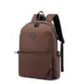 Durable brown polyester school laptop backpack with multi pockets and comfortable straps. - Coffee