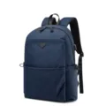 Blue polyester student school laptop backpack with USB port and multiple storage pockets. - Deep Blue