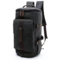 Dark grey canvas backpack with brown leather trim, vertical cylindrical travel school bag. - L / Black