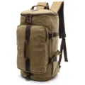 Durable canvas backpack in khaki, featuring a cylindrical design with ample storage for travel. - L / Khaki