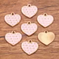 Pendentifs coeurs en alliage dores pour la creation de bijoux et accessoires faits main. - 1 Pièce / Rose