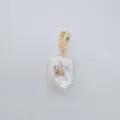 Baroque freshwater pearl pendant with gold plated clasp and sparkling zircon star charm detail. - Star Style