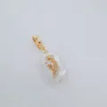 Baroque freshwater pearl pendant with gold plated celestial motif and universal clasp for DIY. - Leaf Style