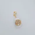 Close-up detail of luxury baroque pearl pendant featuring rhinestone clover motif with roman numerals. - Clover Style