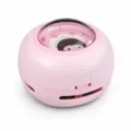 Pink mini desktop vacuum cleaner, portable handheld device for school and office desk use. - Battery Powered / Pink