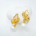 Elegant gold butterfly pearl earrings with natural mother-of-pearl and crystal accents. - White Shell Butterfly Stud Earrings (With Natural Pearl) / Regular Fit / Gold