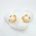 Exquisite gold-plated pearl flower stud earrings, elegant detail display showing glossy texture. - Flower - Natural Pearl