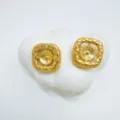 Detailed view of vintage gold geometric square earring accessories, fine texture. - Square - Empty Settings