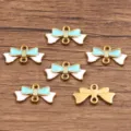 Gold enamel bow connector charm, light blue and white color, 8x17mm DIY jewelry making accessory. - 1 Piece / Blue