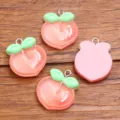DIY resin peach charms, cute fruit pendants with metal loops for jewelry making crafts. - 1 Piece (21x26mm)