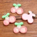 DIY resin cherry charms with metal loop, cute pink fruit pendants for handmade jewelry crafting. - 1 Piece/Pack (23x24mm)