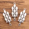DIY metalika exartimata kosmima sindetikos me psaria 7 mikra charms gia to vrachioli - Αντίκα Ασημί