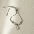 Pulsera de cadena de serpiente deslizante tono plateado con dije de candado y cuentas de cristal - Candado plateado