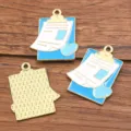 Pendentif breloque émail presse-papiers dossier médical bleu or alliage accessoire bijoux DIY - Style Presse-papiers (13) / 1 Pièce (22x27mm) / Bleu